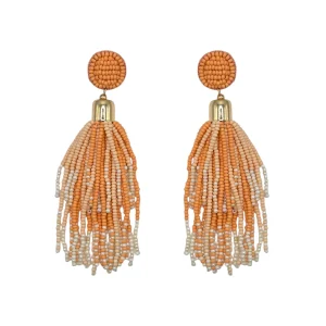 Peach and ivory beaded tassel statement earrings with gold-tone detail